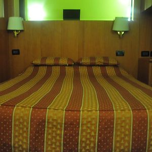 Kamer met een Queen Size Bed